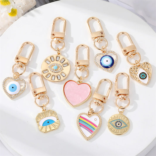 Dot Drilling Alloy Love Eye Keychain