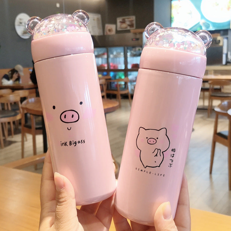 Cute pink pig bottle with glitter lid