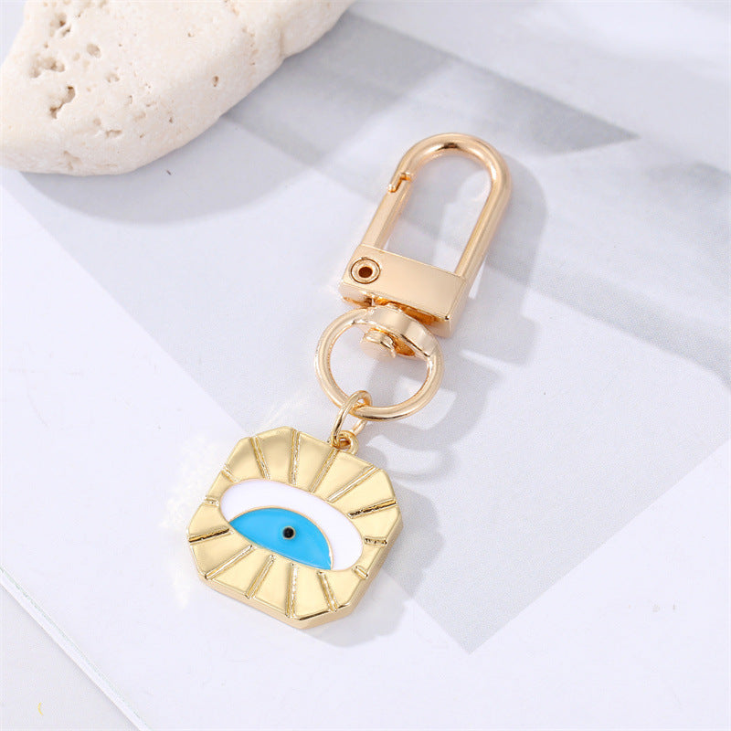 Dot Drilling Alloy Love Eye Keychain